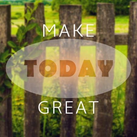 "Make Today Great" text on blurred wallpaper as inspirational quoteの写真素材