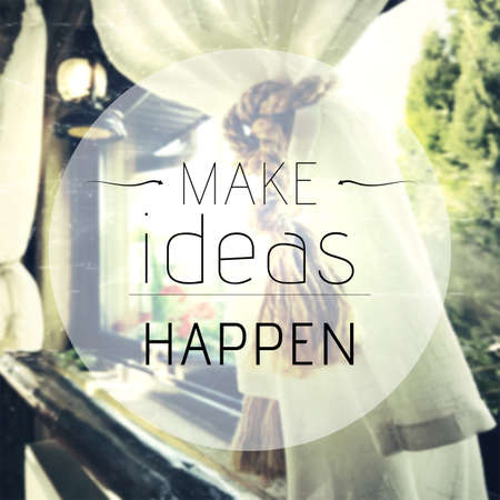 Inspirational quote on vintage background with make ideas happen messageの写真素材