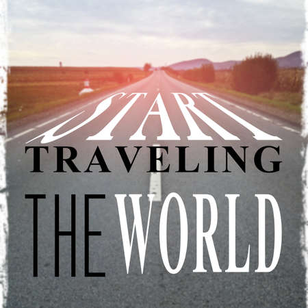 Motivational quote with start traveling the world message with blurred road on bakcgroundの写真素材