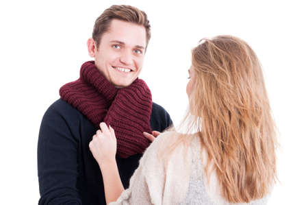 Woman holding man's autumn casual comforter and smiling like being comfy isolated on white backgroundの写真素材
