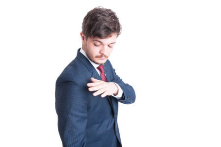 Portrait of marketing manager cleaning suit from clothes scam isolated on white background with copy text spaceの写真素材