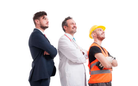 Successful leaders with different professions with folded arms as great collaboration concept isolated on whiteの写真素材