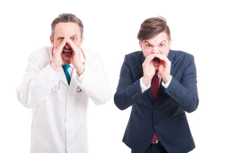 Angry medic or doctor and business man yelling or screaming out loud isolated on whiteの写真素材