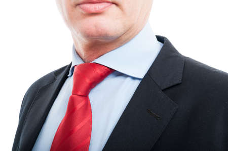 Close-up of senior business man shirt and tie isolated on white backgroundの写真素材