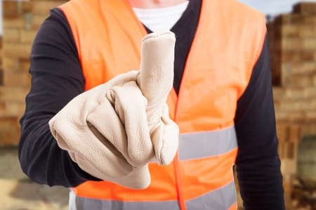 Closeup of male architect finger pointing on virtual screen as modern technology concept