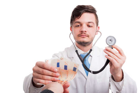 Patient is giving money to a doctor in hospital with stethoscope isolated on white background