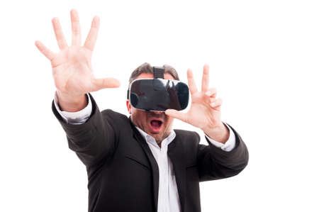 Man with virtual reality goggles in scary action on white background