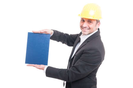 Portrait of contractor wearing hardhat holding blue cardboard and smiling isolated on white...