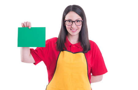 Supermarket assistant with blank paper in hands with copy space isolated on white backgroundの写真素材