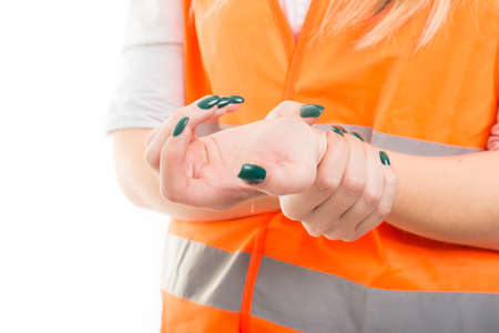 Closeup of woman suffering from pain in wrist or having medical problemsの写真素材