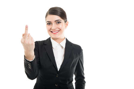 Portrait of beautiful female flight attendant showing obscene gesture and smiling isolated on white background with copyspace advertising areaの写真素材