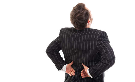 Back view of business man showing back pain gesture isolated on white background with copyspace advertising areaの写真素材