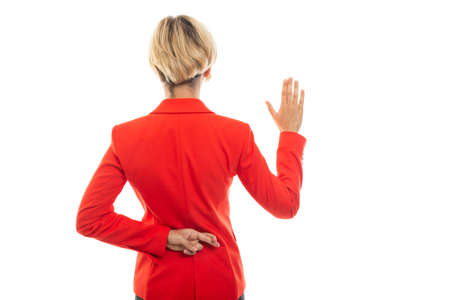 Back view of business woman showing fake oath gesture isolated on white background