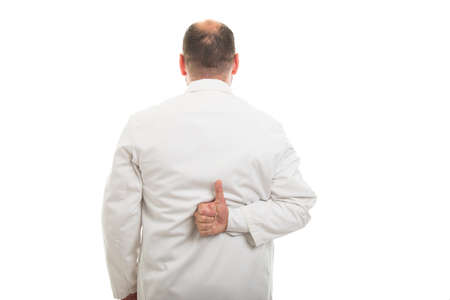 Back view of male doctor showing thumb up gesture isolated on white background with copyspace...
