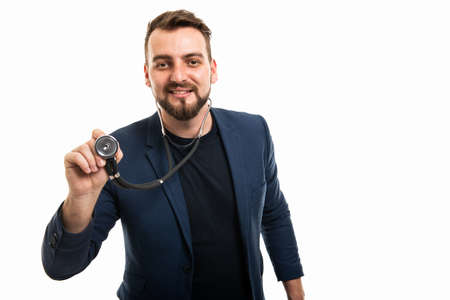 Medic wearing smart casual clothes using stethoscope isolated on white background with copy space advertising areaの写真素材