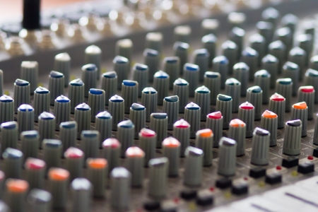 Close-up of dj studio audio editing panel