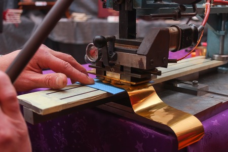 Book binder embossing paper card with gold foilの写真素材