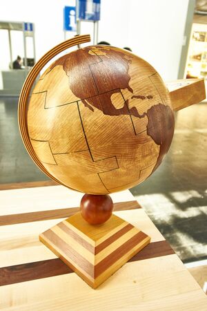 Wooden globe facing Americaの写真素材