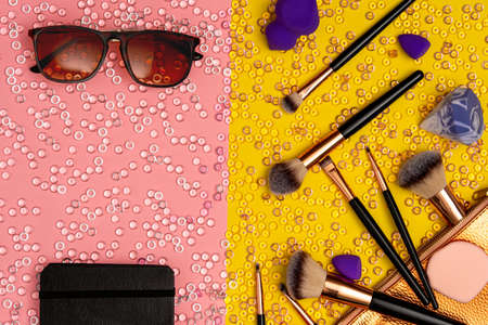 Set of black makeup brushes with cosmetic accessories