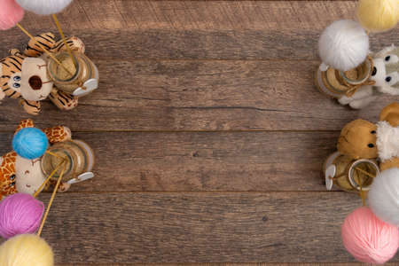 Plushy husky and stuffed animals on wooden backgroundの写真素材