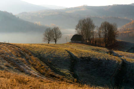 Beautiful autumnal landscape in rural Carpathian mountains of Romania, Dumesti village, Alba county,...