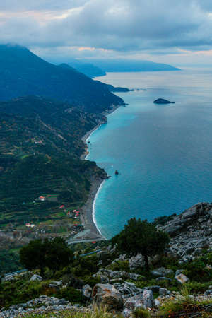 View of Evia island rocky coast in autumn. Beautiful top view of mountains and the sea in a foggy weather in Evia island.の写真素材