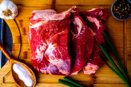 Close-up view of raw meat on cutting board