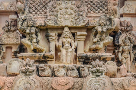 Hindu God statue on a wall in Hindu Brihadeeswarar Temple, Thanjavur, Tamil Nadu, Indiaの写真素材