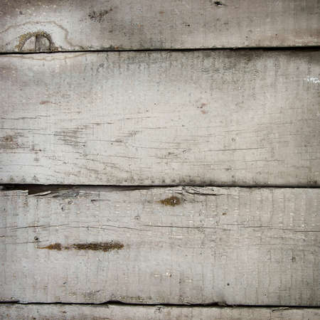 White grunge wood close-up background. Painted old wooden wall.の写真素材