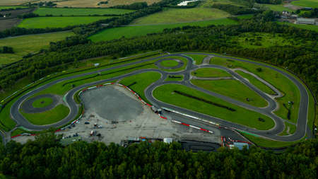 Aerial drone view of a go kart car race track circuit at sunsetの写真素材