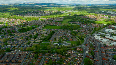 Aerial view of British houses with the countryside in the backgroundの写真素材
