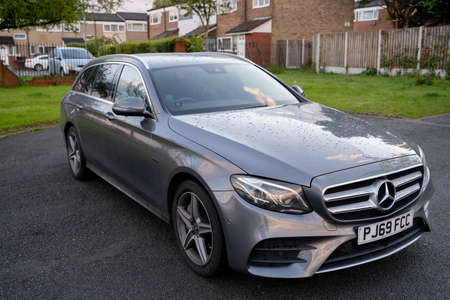 London, UK, May 18, 2021: Mercedes-Benz E 300 DE Plug-In Hybrid Break EQ Powerのeditorial素材