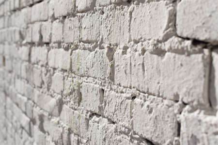 Decorative stucco background with textured sand with rough ragged edges gray white dirty color