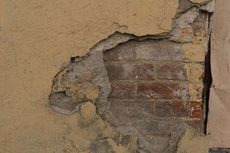 Decorative stucco background with textured sand with rough ragged edges gray white dirty colorの写真素材