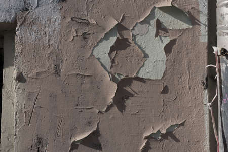 Decorative stucco background with textured sand with rough ragged edges gray white dirty colorの写真素材
