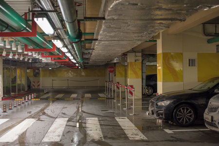 Moscow / Russia - Febuary 13, 2019: Empty and dirty underground parking in the mallのeditorial素材
