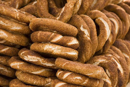 Pile of Turkish bagels with sesame called  simit 
