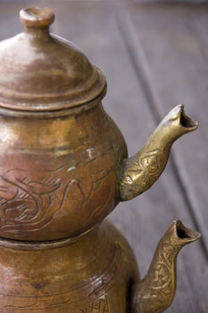 Old copper teapot for Turkish traditional tea drinkingの写真素材
