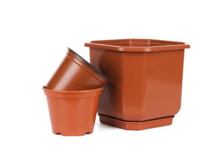 Gardening tools  empty flower pots isolated on whiteの写真素材