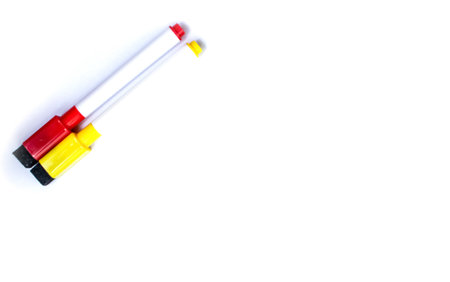 Red and yellow marker isolated items on white background space for text.の写真素材