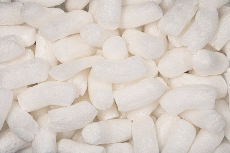Full frame macro shot of white polystyrene packaging material in pellet shapeの写真素材