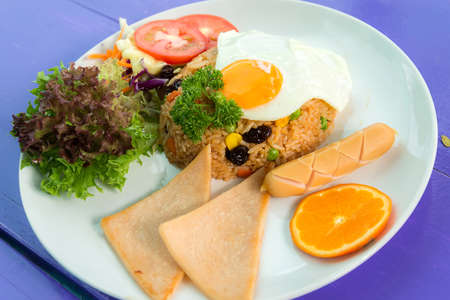 American fried rice on white dishの写真素材