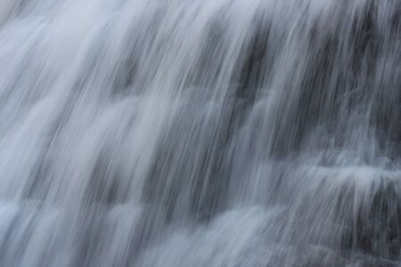 waterfall in the mountainsの写真素材