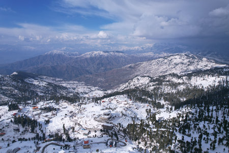 Aerial View of Malam Jabba Hill station and town in the Middle of Himalayan Mountains, covered in snow during winter, Swat Khyber Pakhtunkhwa Pakistanの写真素材