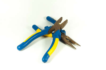 Old pliers in a white background .の写真素材