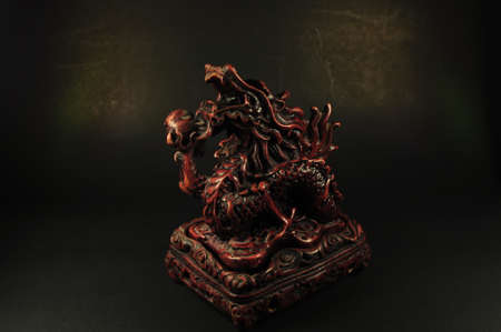 Dragon incense burner on a black backgroundの写真素材