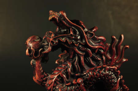 Dragon incense burner on a black backgroundの写真素材