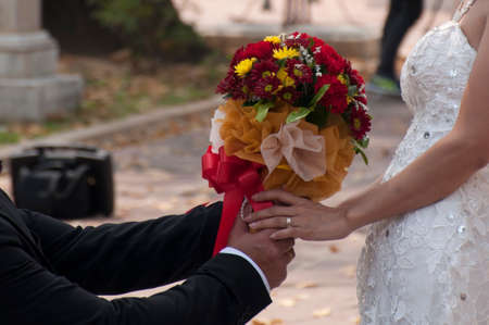 Man and woman holding handsの写真素材