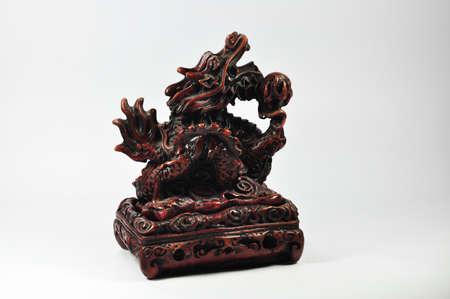 Dragon incense burner on a white backgroundの写真素材
