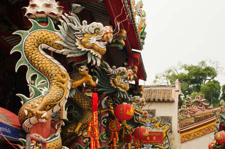 Thailand Chinese dragon pillars in the shrineの写真素材